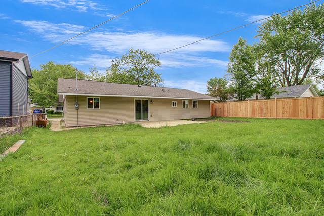 309 Audubon Road Streamwood, IL 60107 - Photo 24 of 25 front view of a house with a yard
