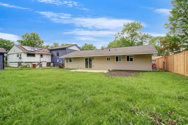 309 Audubon Road Streamwood, IL 60107 - Photo 25 of 25 a view of an house with backyard space and garden