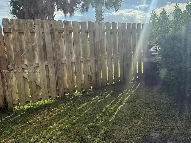 a view of a hallway with entryway