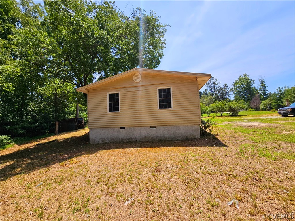 1350 Redd Shop Road Farmville, VA 23901 - Photo 3 of 13 a backyard of a house with large trees