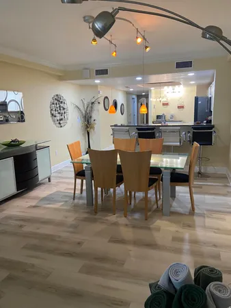 a view of a dining room with furniture