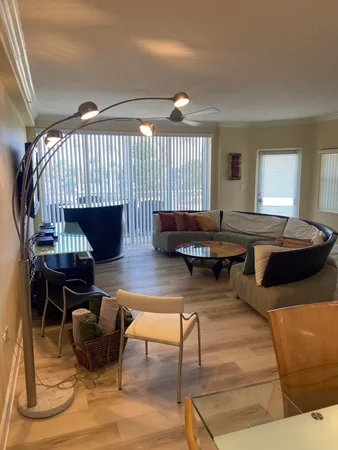 a living room with furniture and a table