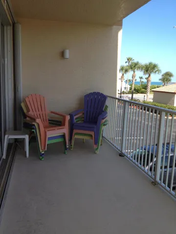 a view of a two chairs in the roof deck
