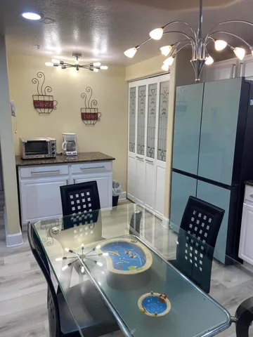 a living room with furniture and a table