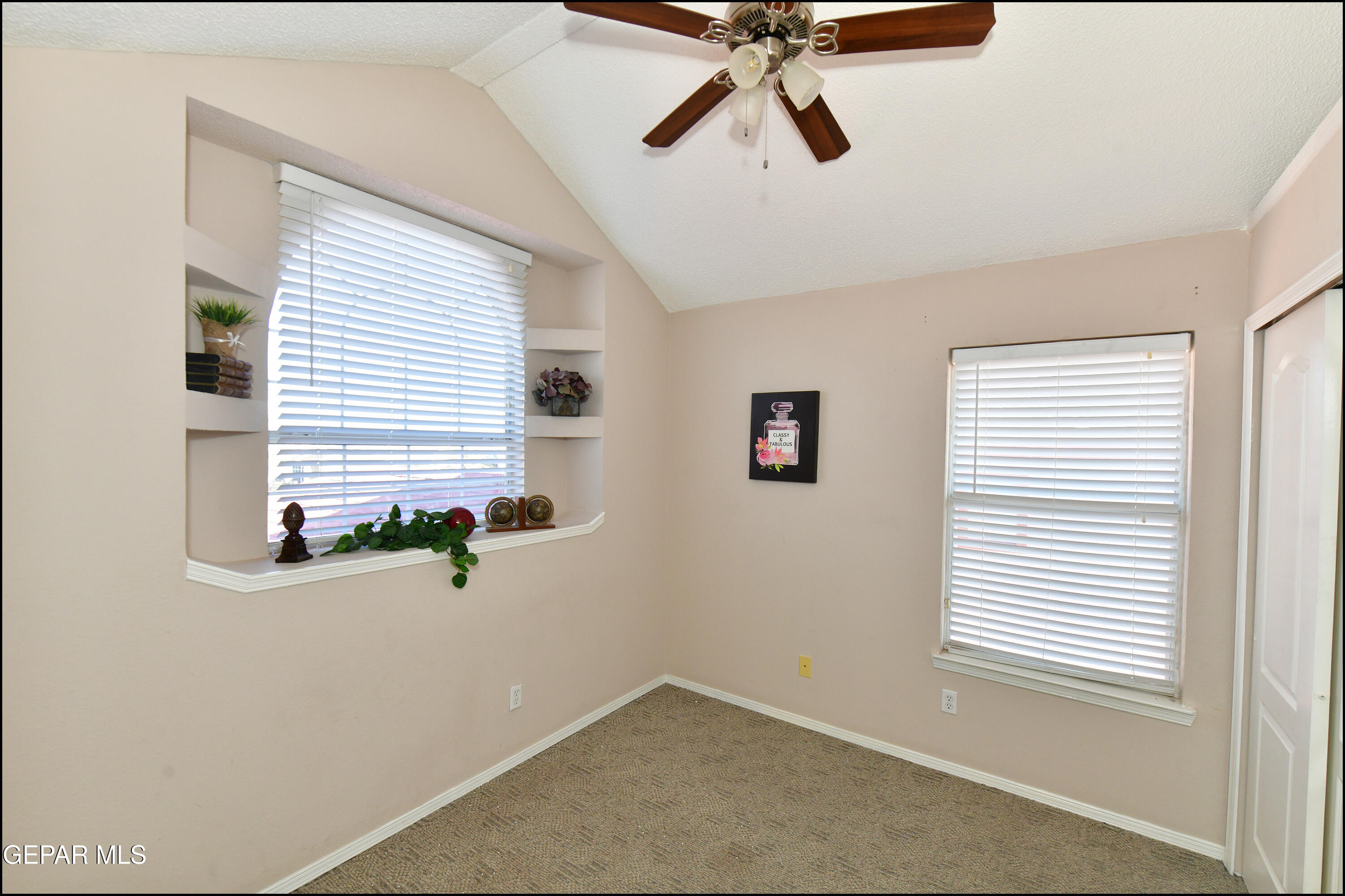 12232 Tierra Rosa Way El Paso, TX 79938 - Photo 21 of 34 a view of an empty room with a window