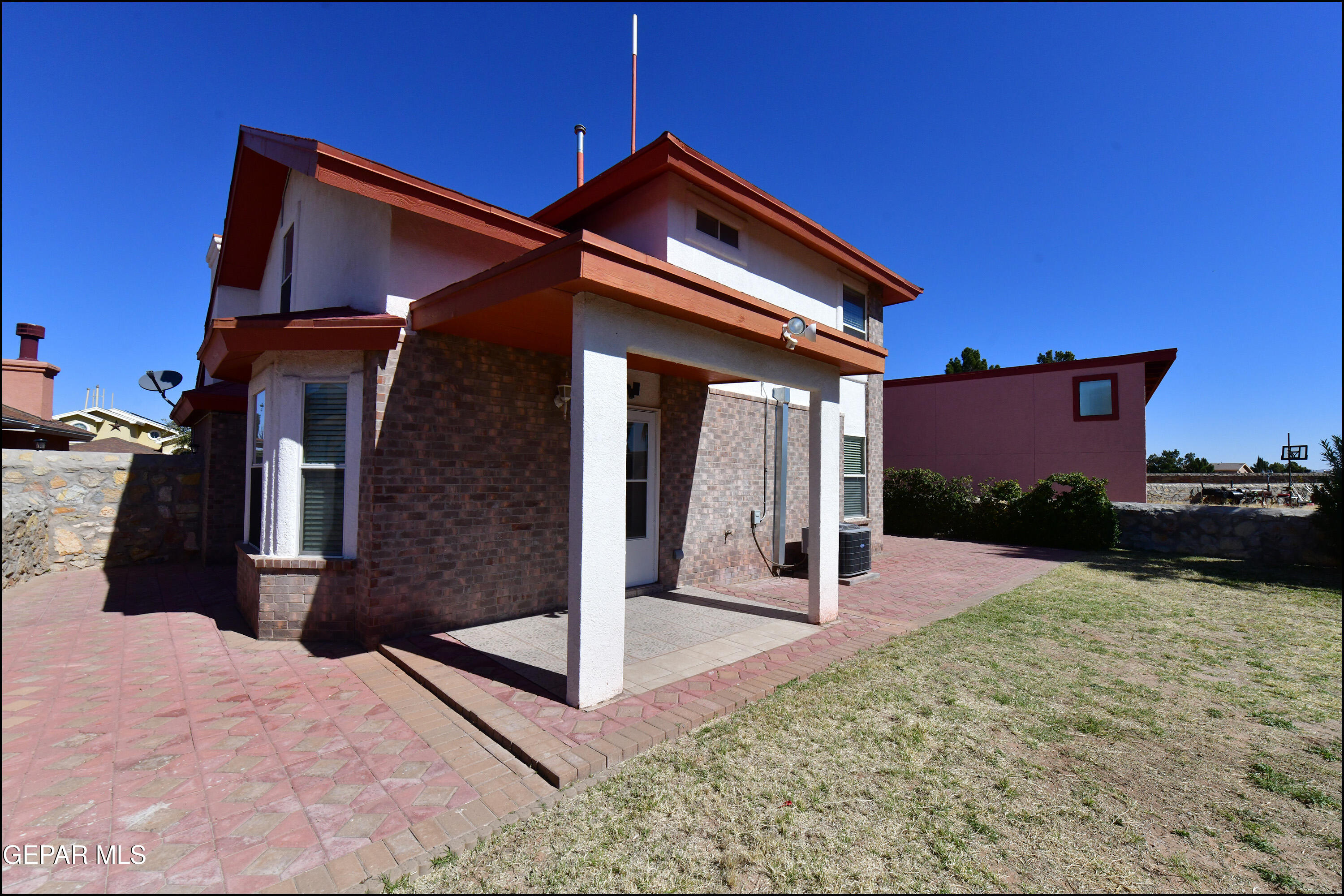 12232 Tierra Rosa Way El Paso, TX 79938 - Photo 26 of 34 a front view of a house with garden
