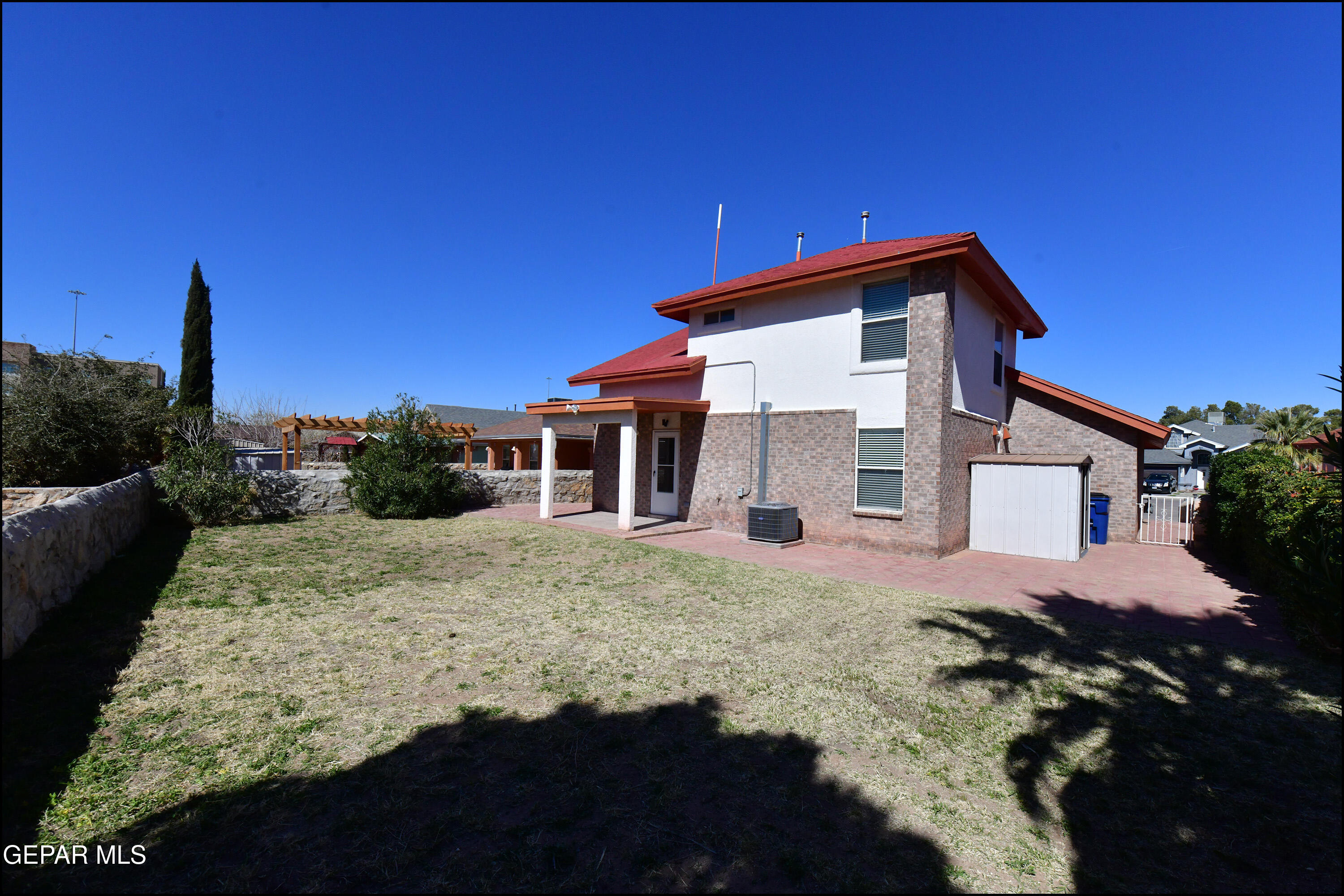 12232 Tierra Rosa Way El Paso, TX 79938 - Photo 27 of 34 a front view of a house with a yard