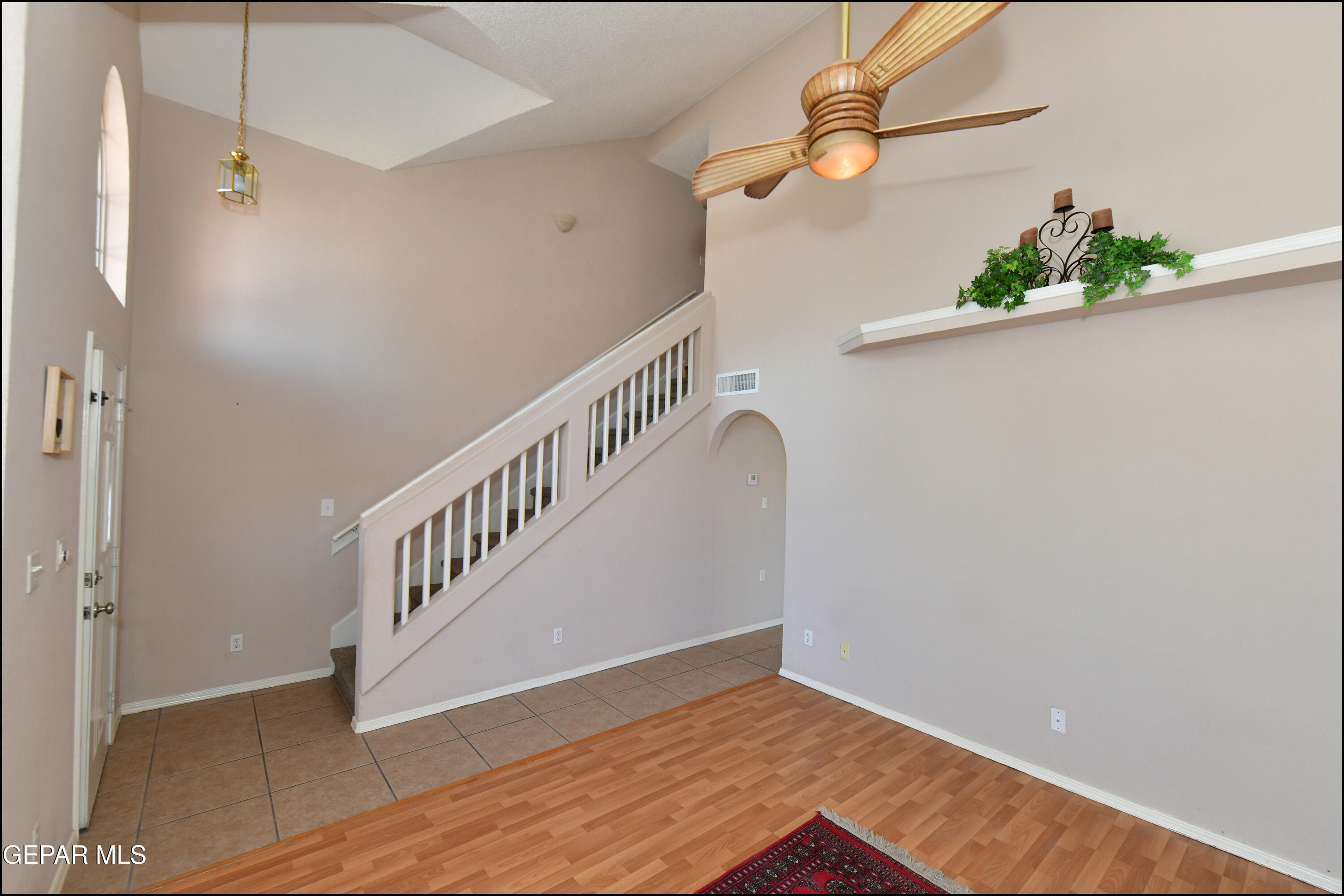 12232 Tierra Rosa Way El Paso, TX 79938 - Photo 4 of 34 a view of an entryway with wooden floor