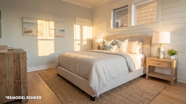 a bedroom with a bed and a night stand