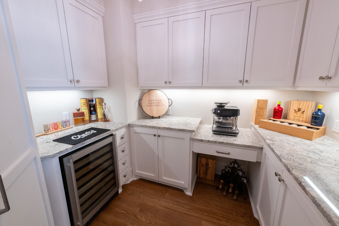 6 Red Sable Point The Woodlands, TX 77380 - Photo 18 of 50 a kitchen with a stove and white cabinets