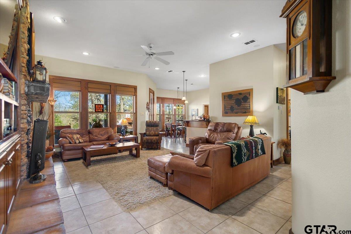 24050 Red Azalea Lindale, TX 75771 - Photo 6 of 48 a living room with furniture and a fireplace
