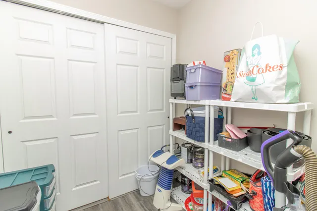 a room with furniture and a wooden floor