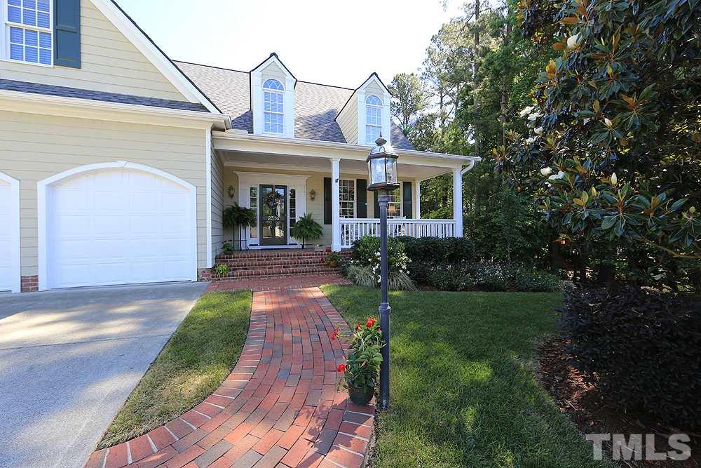 2516 Wertherson Lane Raleigh, NC 27613 - Photo 2 of 25 Brick walkway