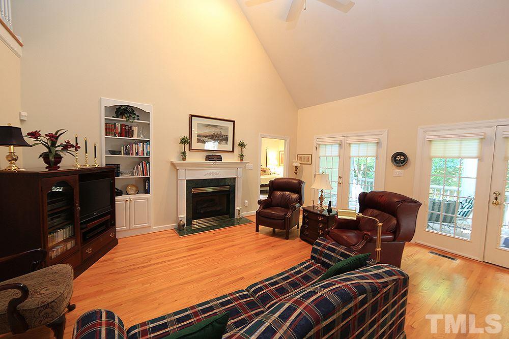 2516 Wertherson Lane Raleigh, NC 27613 - Photo 11 of 25 Two story family room w/ hardwood floors.