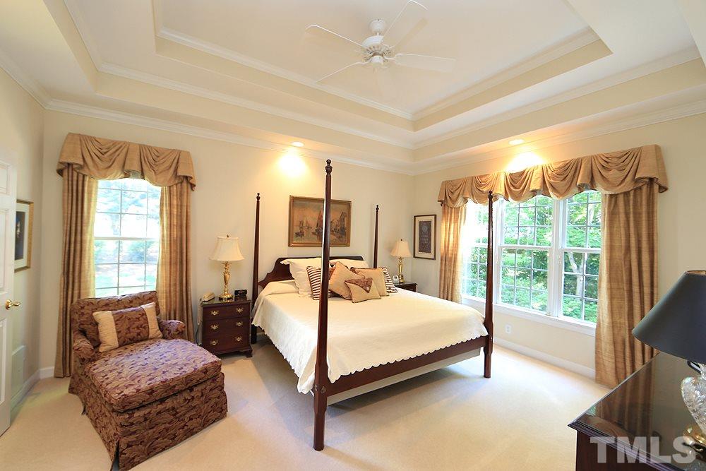 2516 Wertherson Lane Raleigh, NC 27613 - Photo 12 of 25 Master bedroom w/ double tray ceiling. Great views of private backyard.