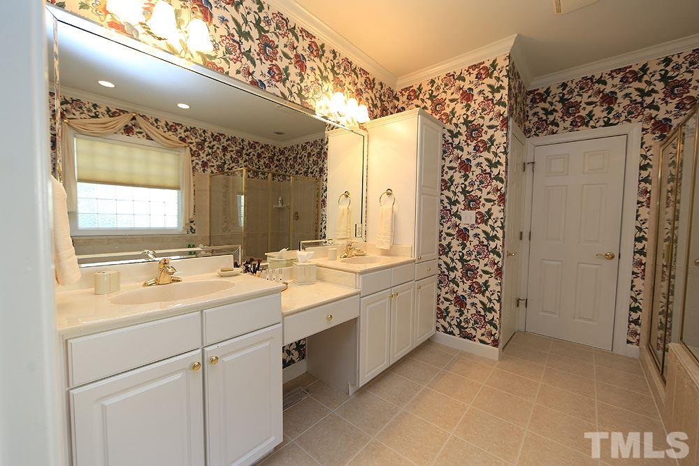 2516 Wertherson Lane Raleigh, NC 27613 - Photo 14 of 25 Double vanity and make-up area.