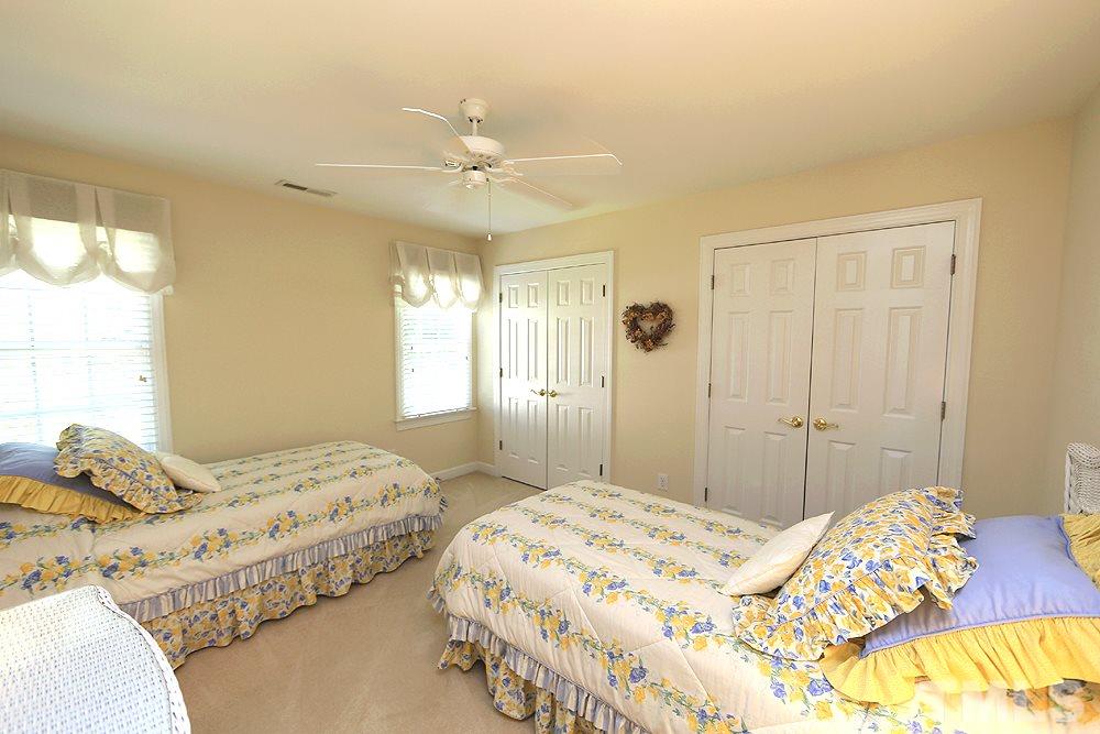 2516 Wertherson Lane Raleigh, NC 27613 - Photo 17 of 25 Bedroom #3 has direct access to a full bath.