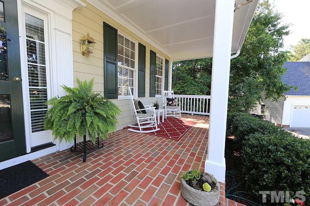 2516 Wertherson Lane Raleigh, NC 27613 - Photo 3 of 25 Welcoming covered front porch w/ brick pavers
