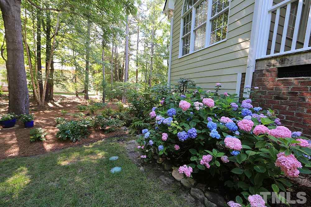 2516 Wertherson Lane Raleigh, NC 27613 - Photo 20 of 25 Professionally landscaped and maintained yard