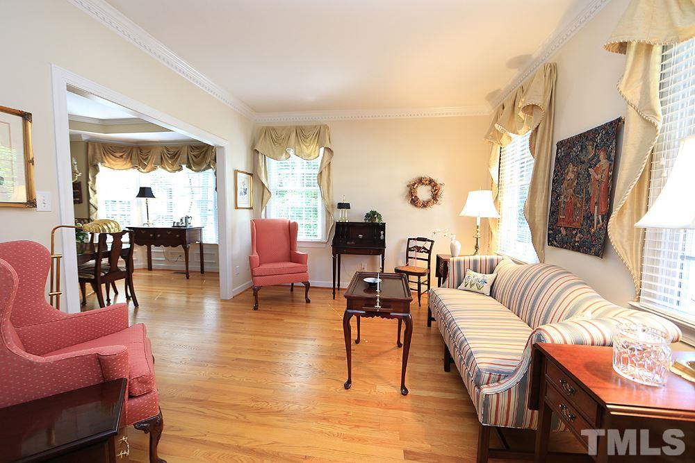 2516 Wertherson Lane Raleigh, NC 27613 - Photo 5 of 25 Formal living room or office w/ hardwood floors.
