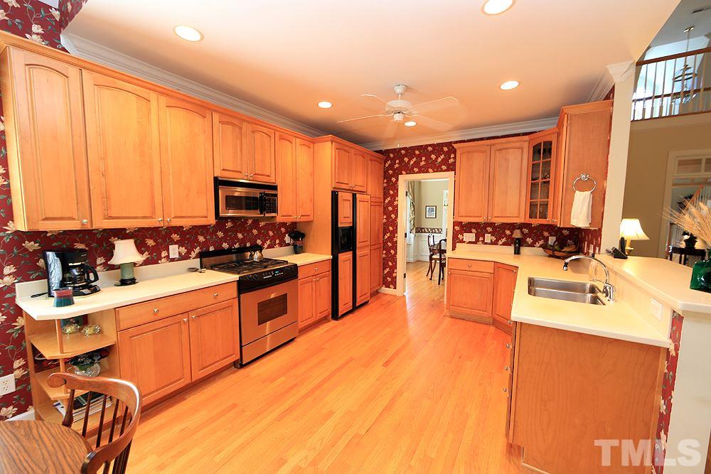 2516 Wertherson Lane Raleigh, NC 27613 - Photo 8 of 25 Natural Maple "Decora" cabinets by Apex Cabinet Company