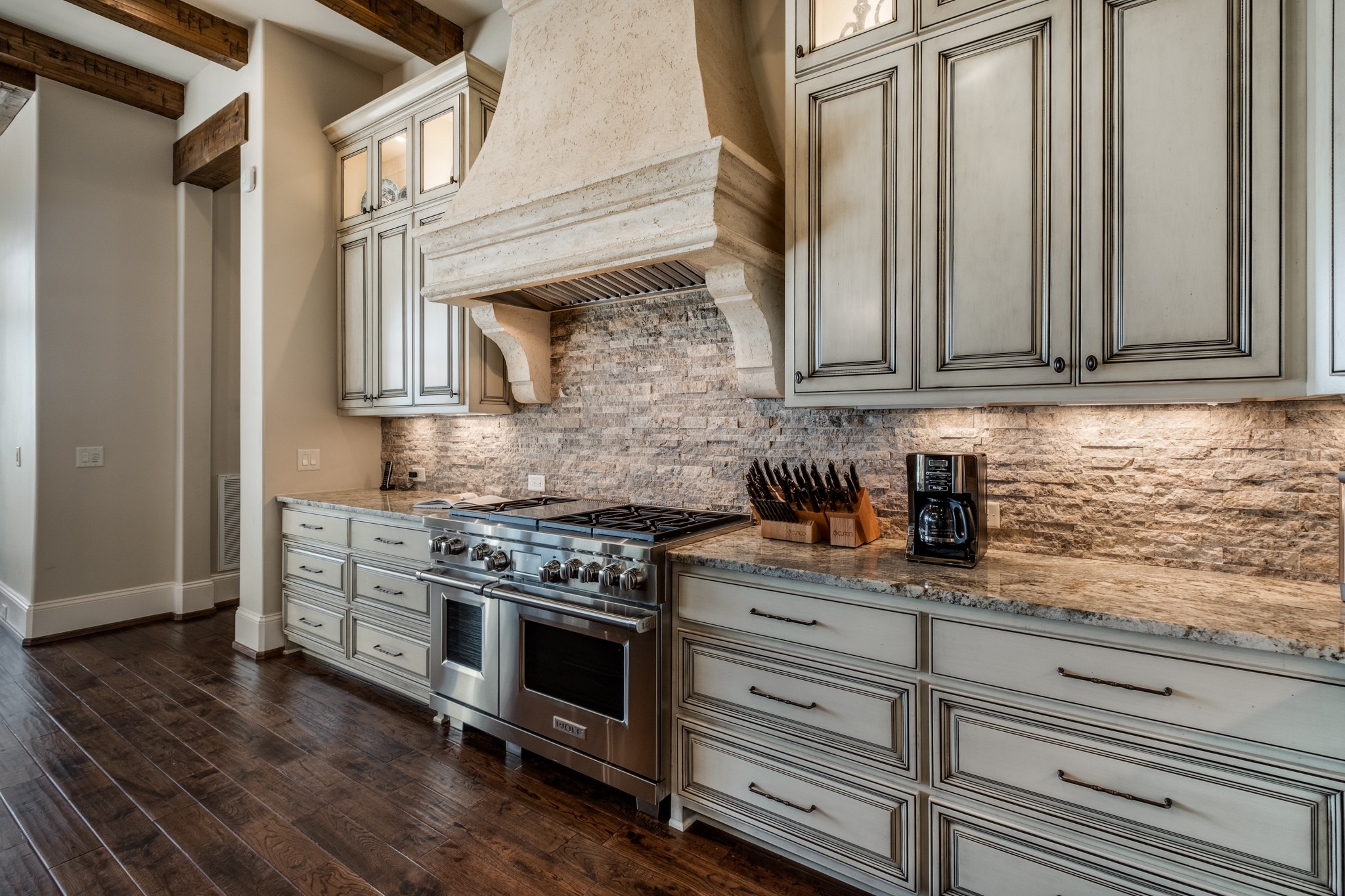 505 Legends Ridge Court Franklin, TN 37069 - Photo 16 of 70 a kitchen with stainless steel appliances granite countertop a stove and a white cabinets
