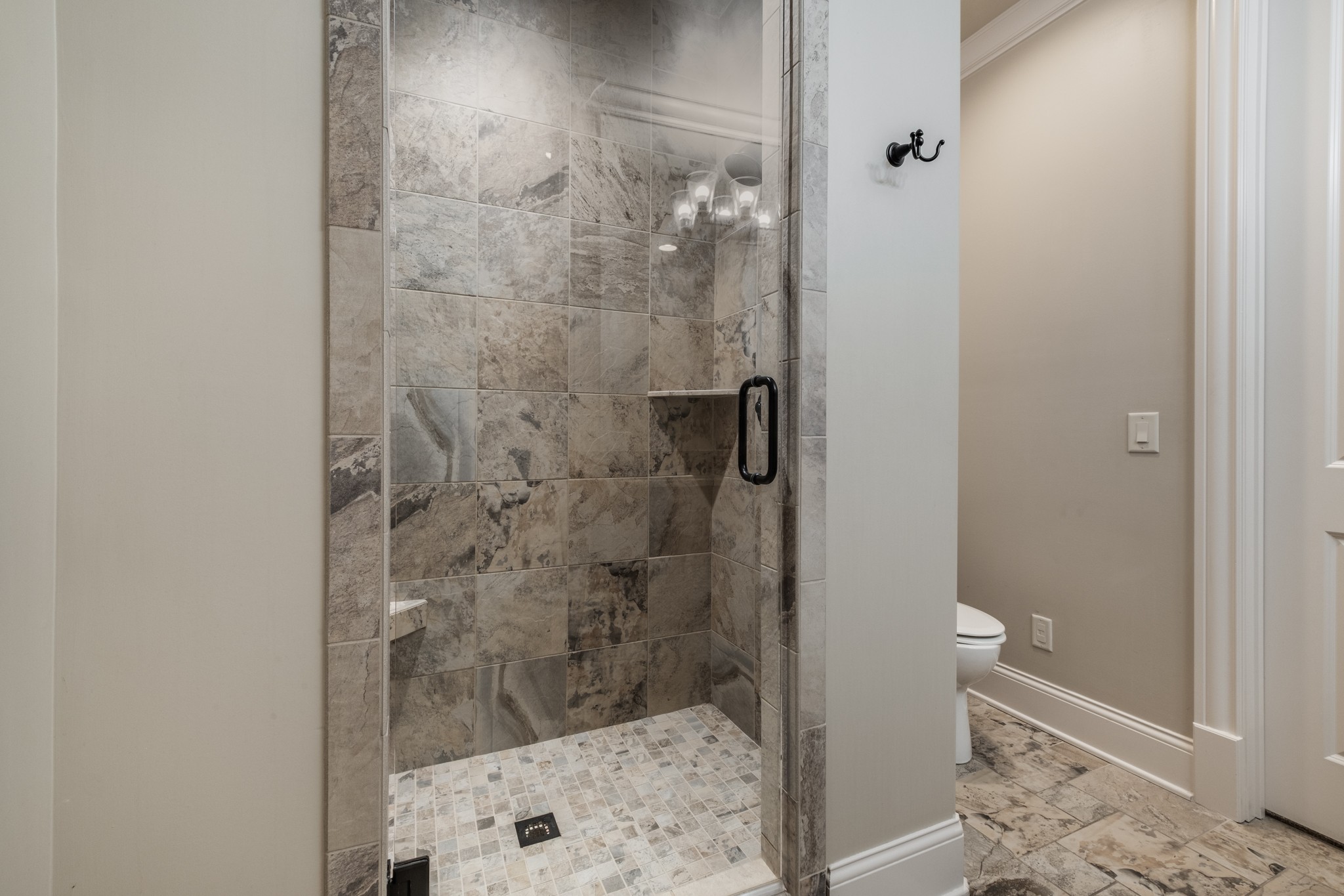 505 Legends Ridge Court Franklin, TN 37069 - Photo 43 of 70 a bathroom with a shower and a sink