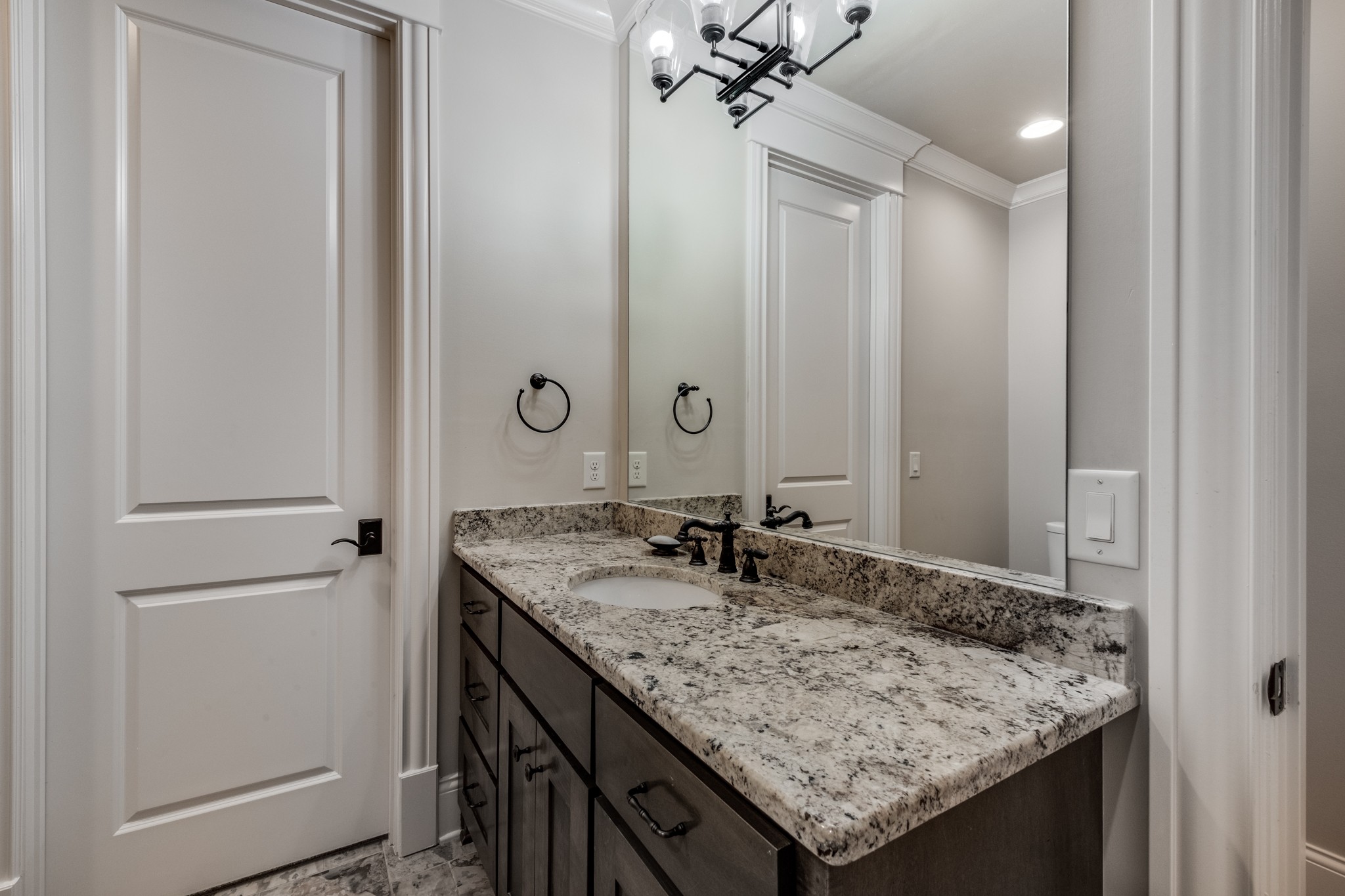 505 Legends Ridge Court Franklin, TN 37069 - Photo 44 of 70 a bathroom with a granite countertop sink and a mirror