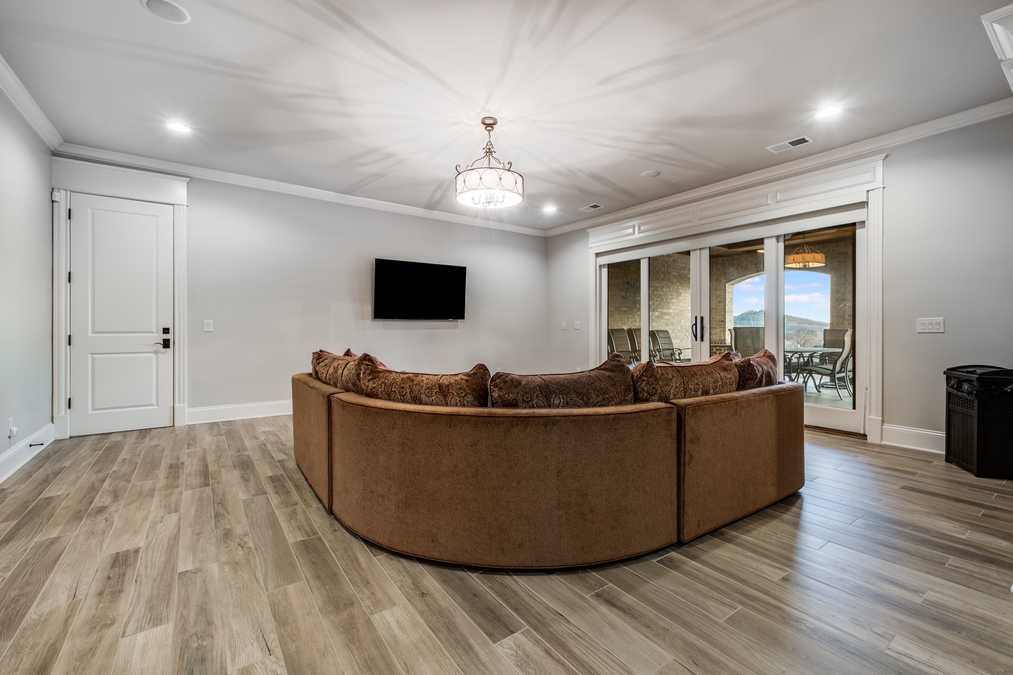 505 Legends Ridge Court Franklin, TN 37069 - Photo 50 of 70 a living room with furniture and a flat screen tv