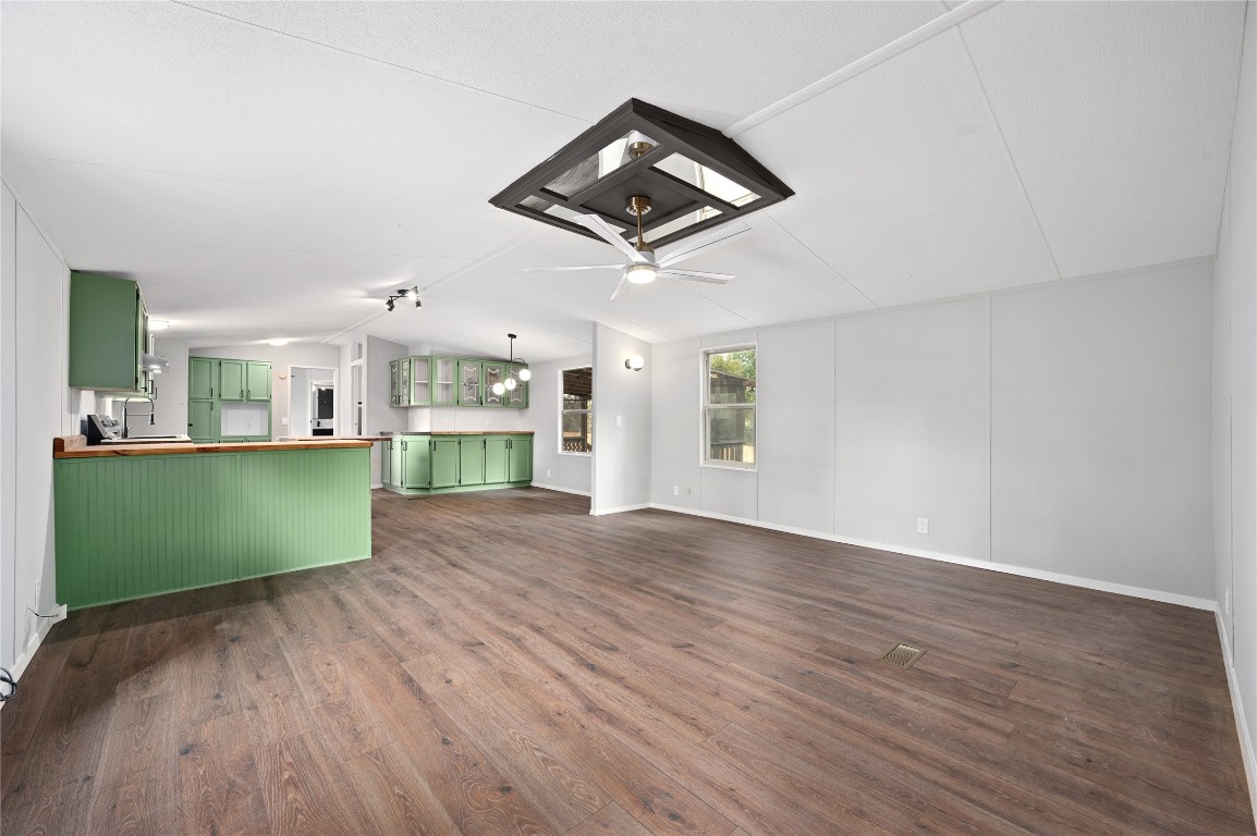 20123 McShepherd Road Georgetown, TX 78626 - Photo 6 of 27 a view of kitchen with cabinets and wooden floor