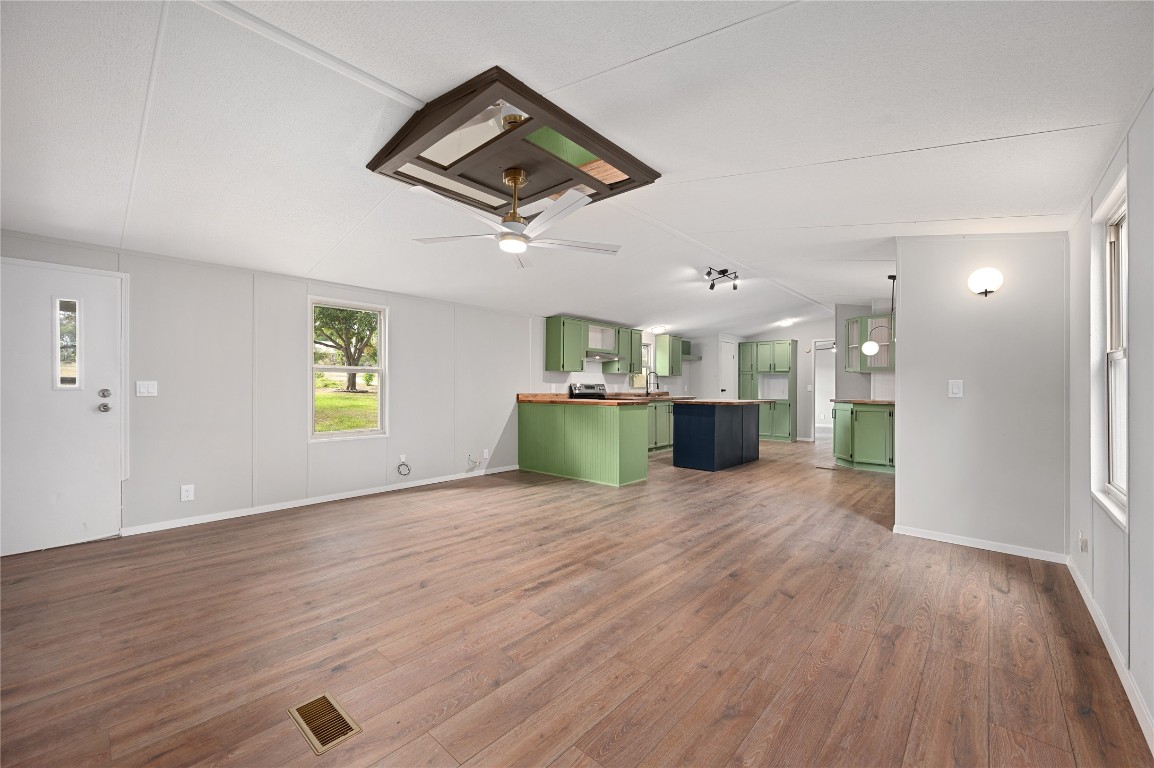 20123 McShepherd Road Georgetown, TX 78626 - Photo 27 of 27 a view of a kitchen with a sink and a microwave