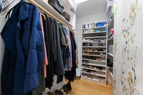 a living room with furniture or couch and a large window