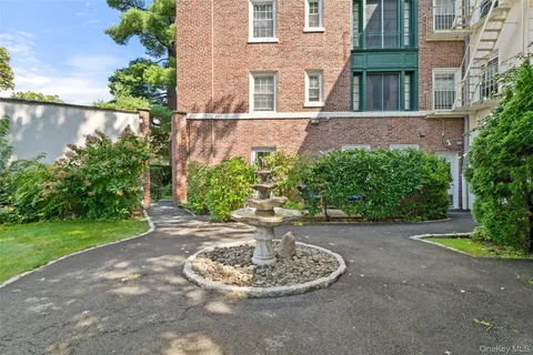 a view of a field with a tree