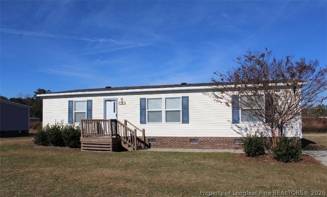 115 Burns Road Lumberton, NC 28358 - Photo 1 of 11 a view of a house with a patio