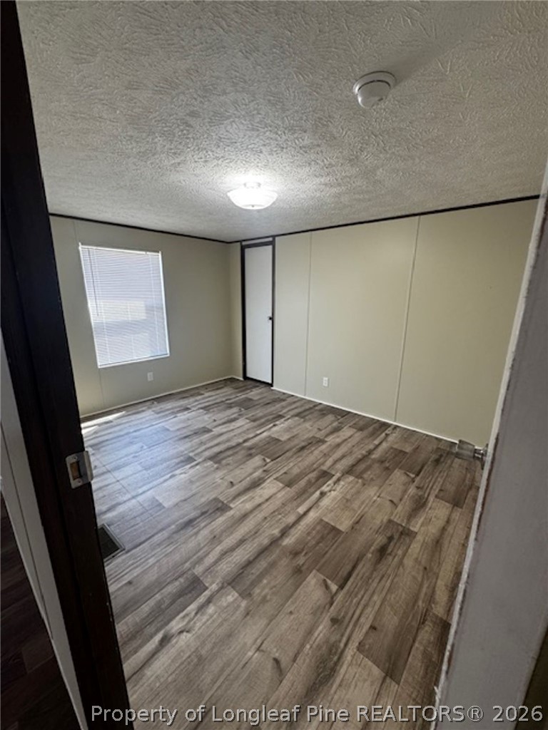 115 Burns Road Lumberton, NC 28358 - Photo 7 of 11 wooden floor in an empty room