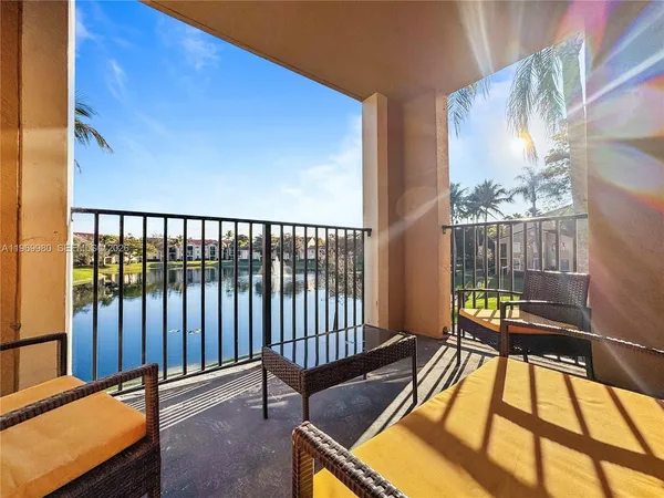 a view of a balcony with chairs