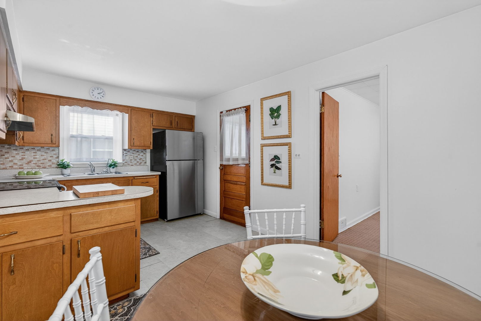 12620 Irving Avenue Blue Island, IL 60406 - Photo 11 of 37 a kitchen with a refrigerator and a sink