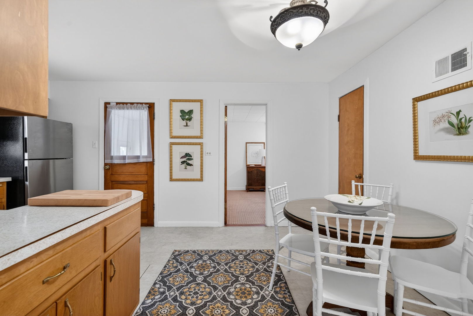 12620 Irving Avenue Blue Island, IL 60406 - Photo 10 of 37 a kitchen with a refrigerator and a stove