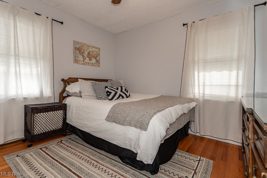 1318 Sunset Road Cleveland, OH 44124 - Photo 14 of 29 First floor Bedroom with hardwood floors and ceiling fan!