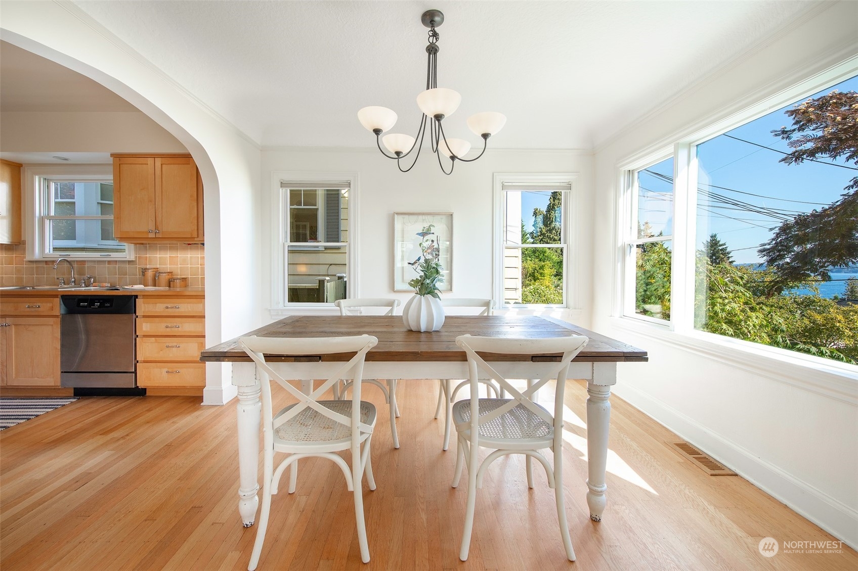 807 Lake Washington Boulevard South Seattle, WA 98144 - Photo 5 of 26 a view of a dining room with furniture window and wooden floor