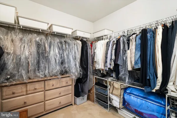 a bathroom with a bathtub and a sink
