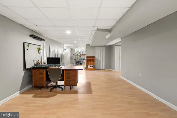 a view of road with large trees