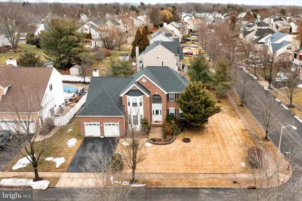 an aerial view of a residential houses