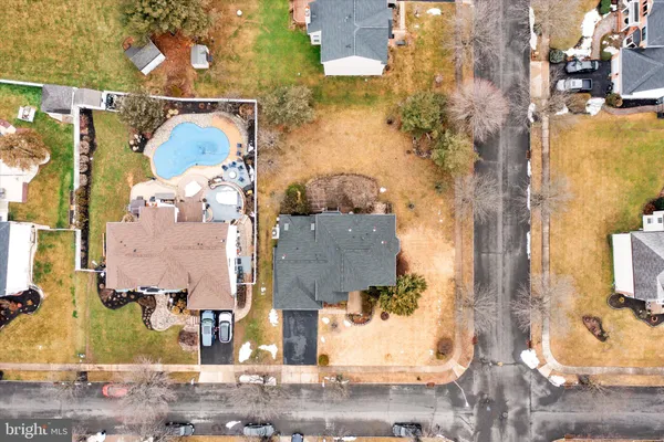 a view of multiple houses with a yard
