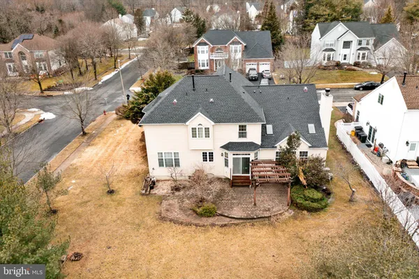 a picture of a bathroom with a white wall
