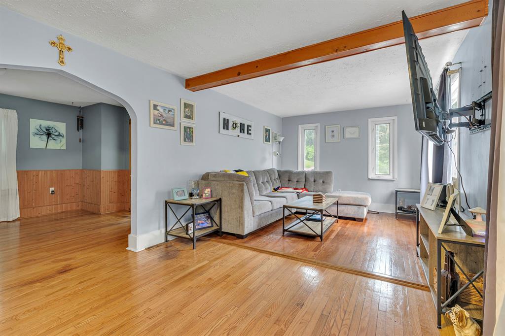 195 Highway 68 Rochester, PA 15074 - Photo 6 of 25 a living room with furniture and a wooden floor