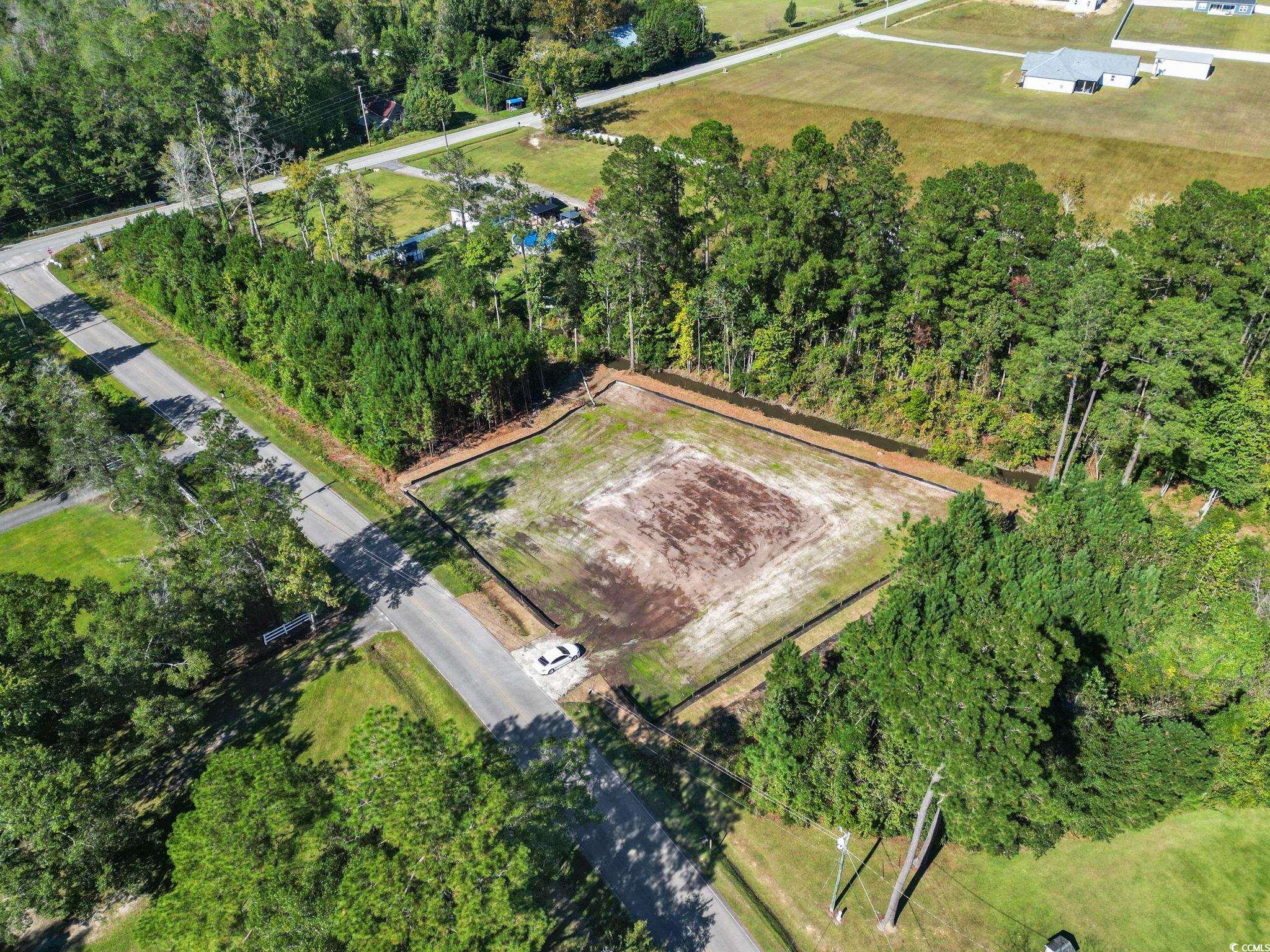 1030 Fowler Road Conway, SC 29526 - Photo 5 of 9 Aerial view of property and surrounding area featuring a tree filled landscape