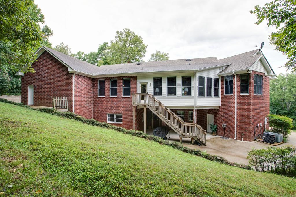 3340 Blazer Road Franklin, TN 37064 - Photo 25 of 29 a view of a house with a yard and sitting area
