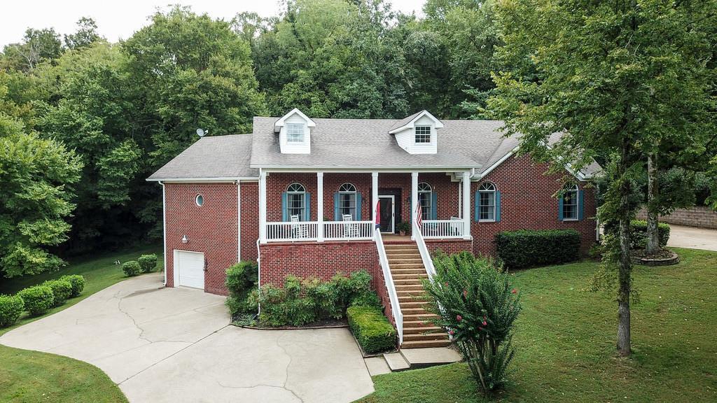 3340 Blazer Road Franklin, TN 37064 - Photo 26 of 29 a front view of a house with garden