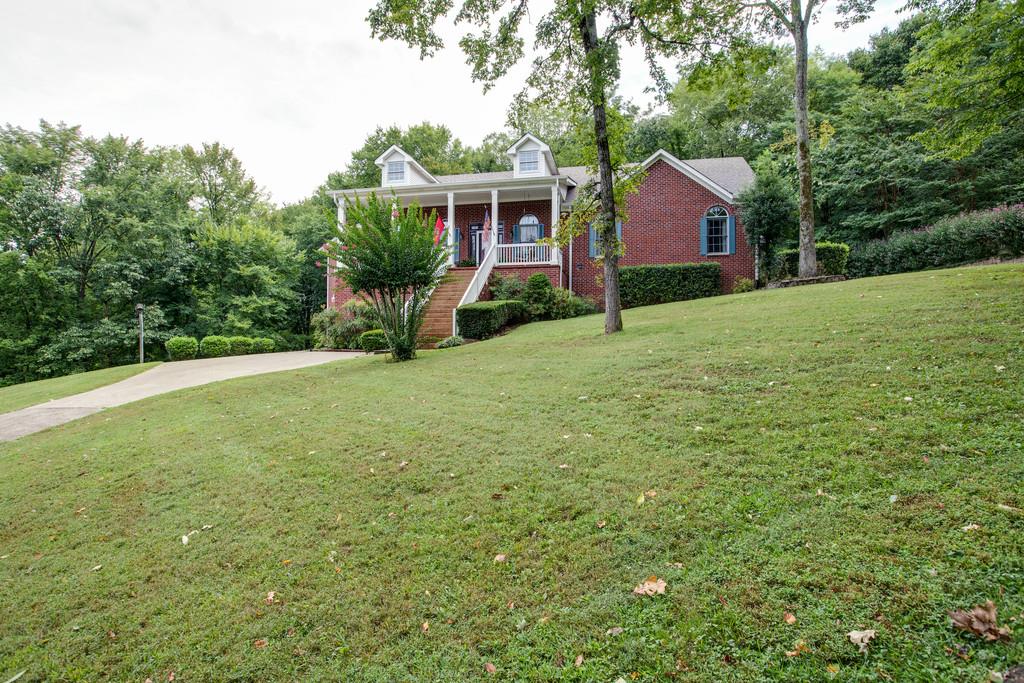 3340 Blazer Road Franklin, TN 37064 - Photo 3 of 29 a view of a house with yard and a garden